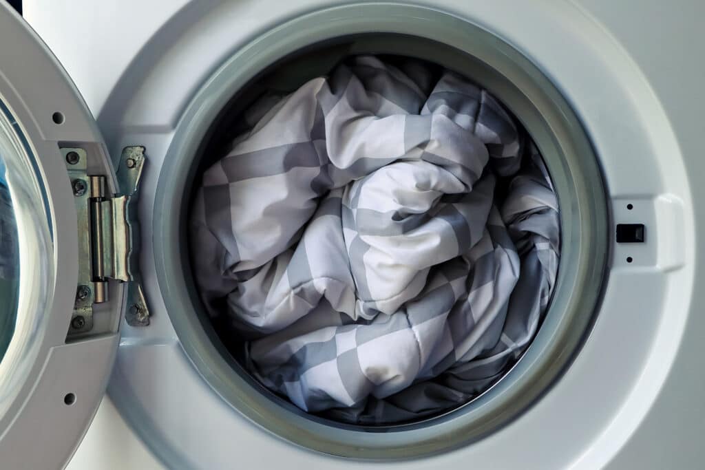 Laver une housse de couette : quelles précautions prendre ?
